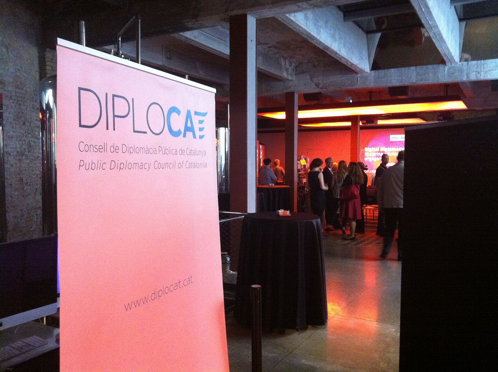 Public Diplomacy Council of Catalonia | Some Tact A banner for the Public Diplomacy Council of Catalonia is displayed at an event.